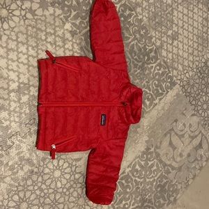 Bright pink Patagonia puffer coat